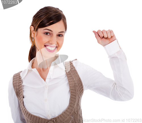 Image of Beautiful young model raising her hand up