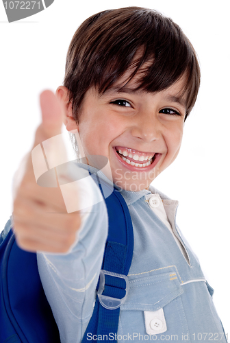 Image of Smiling kinder garden boy gives thumbs up