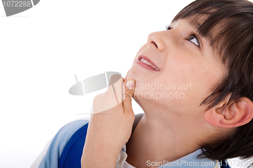 Image of Cute kid thinking and looking up