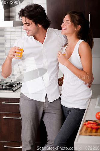 Image of Young couple chatting while thier drink