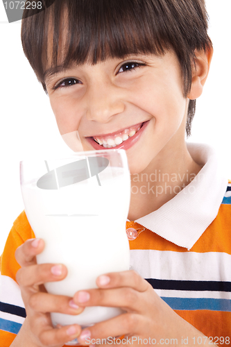 Image of Happy kid drinking glass of milk