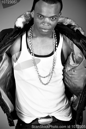 Image of Young stylish black man dancing closeup