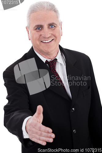 Image of Senior business man making deal with you