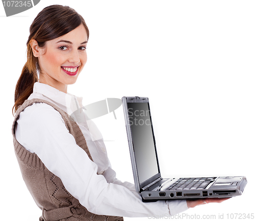 Image of Fashion model holding a open laptop