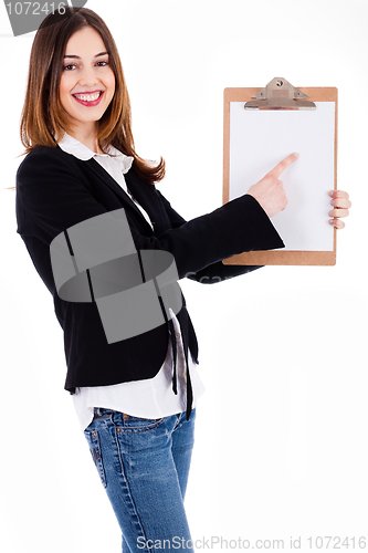 Image of Business women pointing on a blank clip board