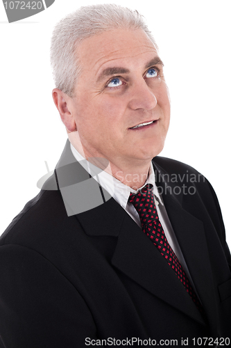 Image of Portrait of thinking senior, business man