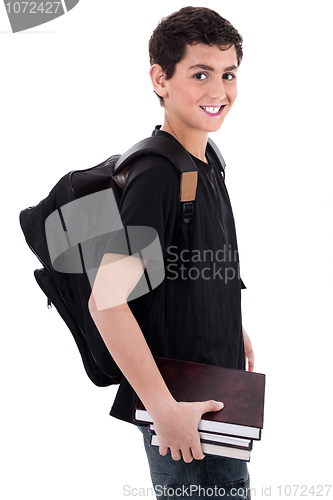 Image of Side pose of handsome teenager boy student with books in hand