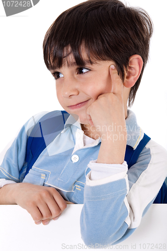 Image of Portrait of a adorable school boy thinking