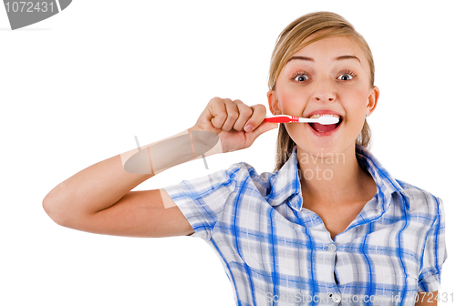 Image of Women brushing her teeth