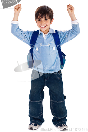 Image of school boy raising his hands up wearing school bag