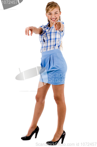 Image of Business women pointing her hands at us