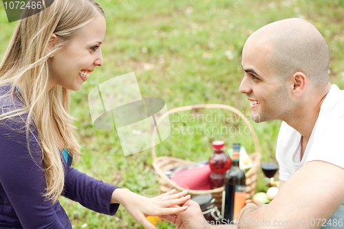 Image of Woman very happy for the gift presented by her husband