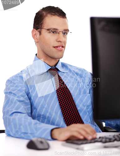 Image of Business man working on his office