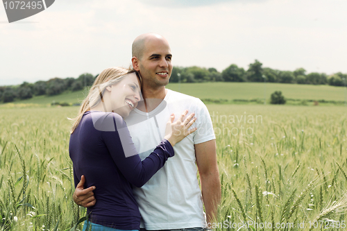 Image of Portrait of happy young couple