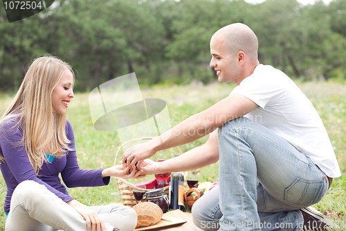 Image of Attractive romantic couple sharing their love