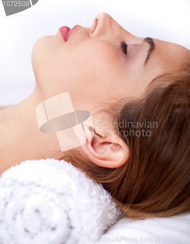 Image of Close up shot of Sleeping young woman in the spa