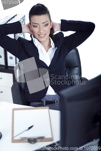 Image of Relaxing business woman at her bay