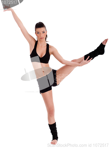 Image of Young woman doing yoga exercise