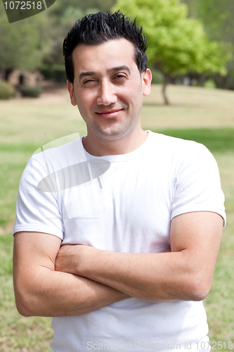 Image of Casual portrait of young man with his hands folded