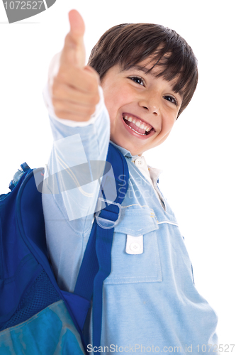 Image of Smiling kinder garden boy gives thumbs up