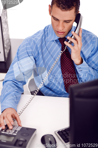 Image of Business man calling