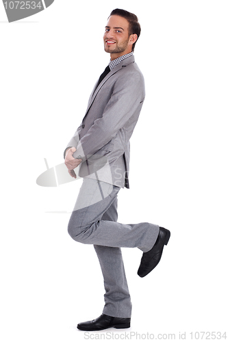 Image of Handsome young business man looking at you
