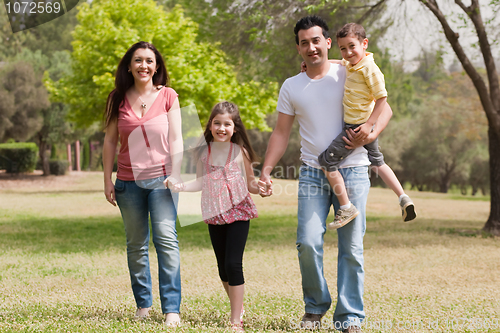 Image of Family playing in the park