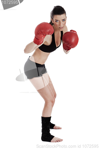 Image of Strong confident woman doing boxing