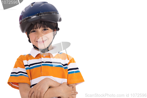 Image of Kid with head cap ready for bicycle ride
