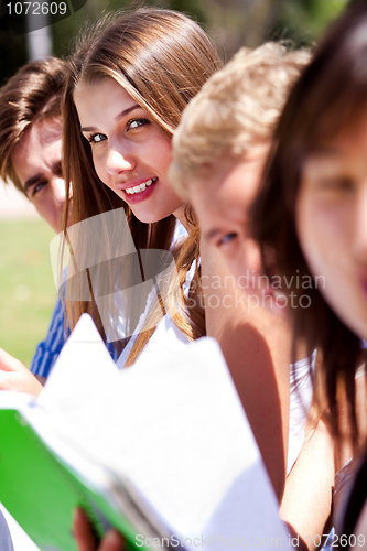 Image of group of students reading books