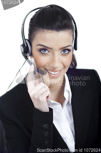 Image of Call center woman dealing with the customer wearing headset