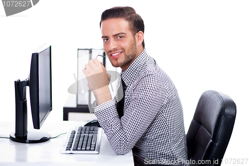 Image of Business man smiling at you in the office