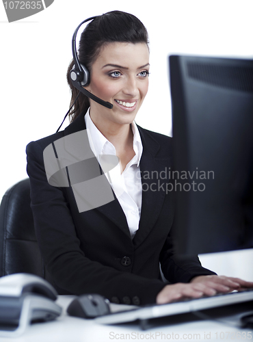 Image of Woman wearing headset in computer room at her cabin