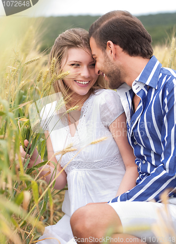 Image of Young couple making fun