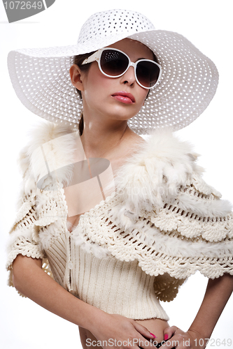 Image of Beautiful woman with sunglasses and white hat