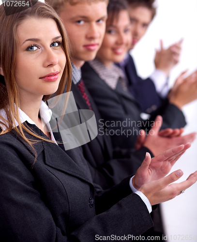Image of Group of business people clapping