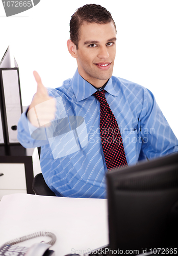 Image of Business man showing thumbs up