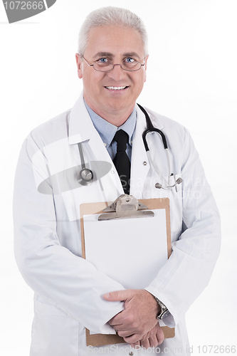 Image of Senior doctor holding clipboard