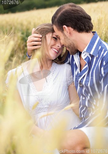 Image of An attractive couple sharing a passionate thoughts