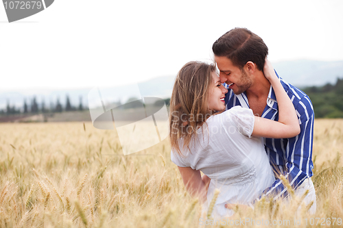 Image of Couple smiling eachother