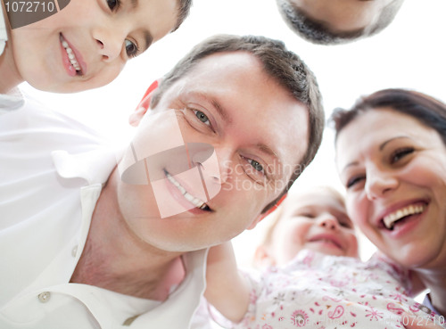Image of Happy family from down view