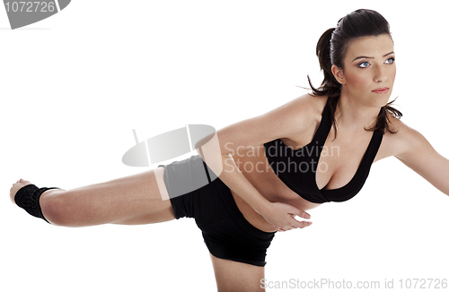 Image of Woman doing fitness exercise in home