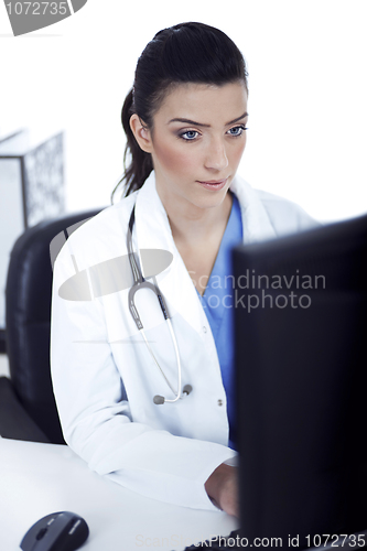 Image of Young doctor working in the computer