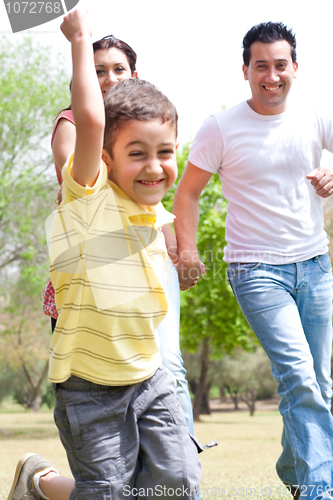Image of Young boy embrassing in the park