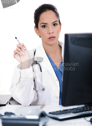 Image of Serious young doctor looking strangely at us