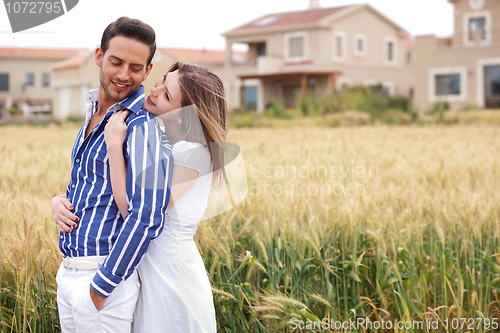 Image of Loving couple, woman hugging her boyfriend