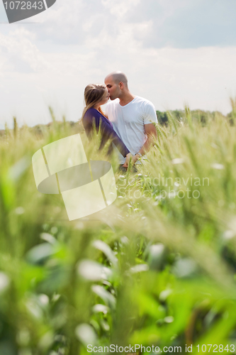 Image of Long shot of the couple giving mouth kiss