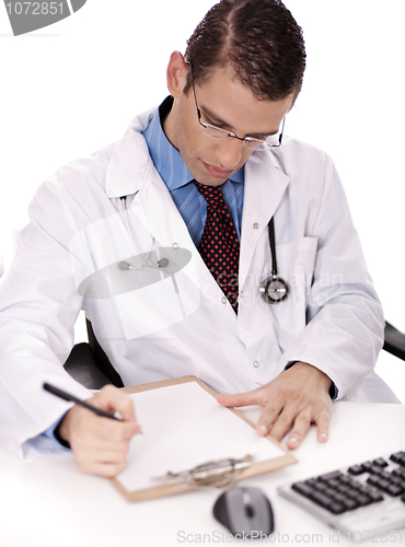 Image of Young physician write down notes