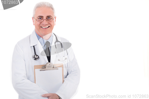 Image of Senior doctor holding clipboard
