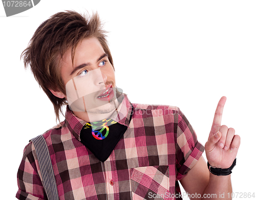 Image of Trendy boy pointing his finger in the left